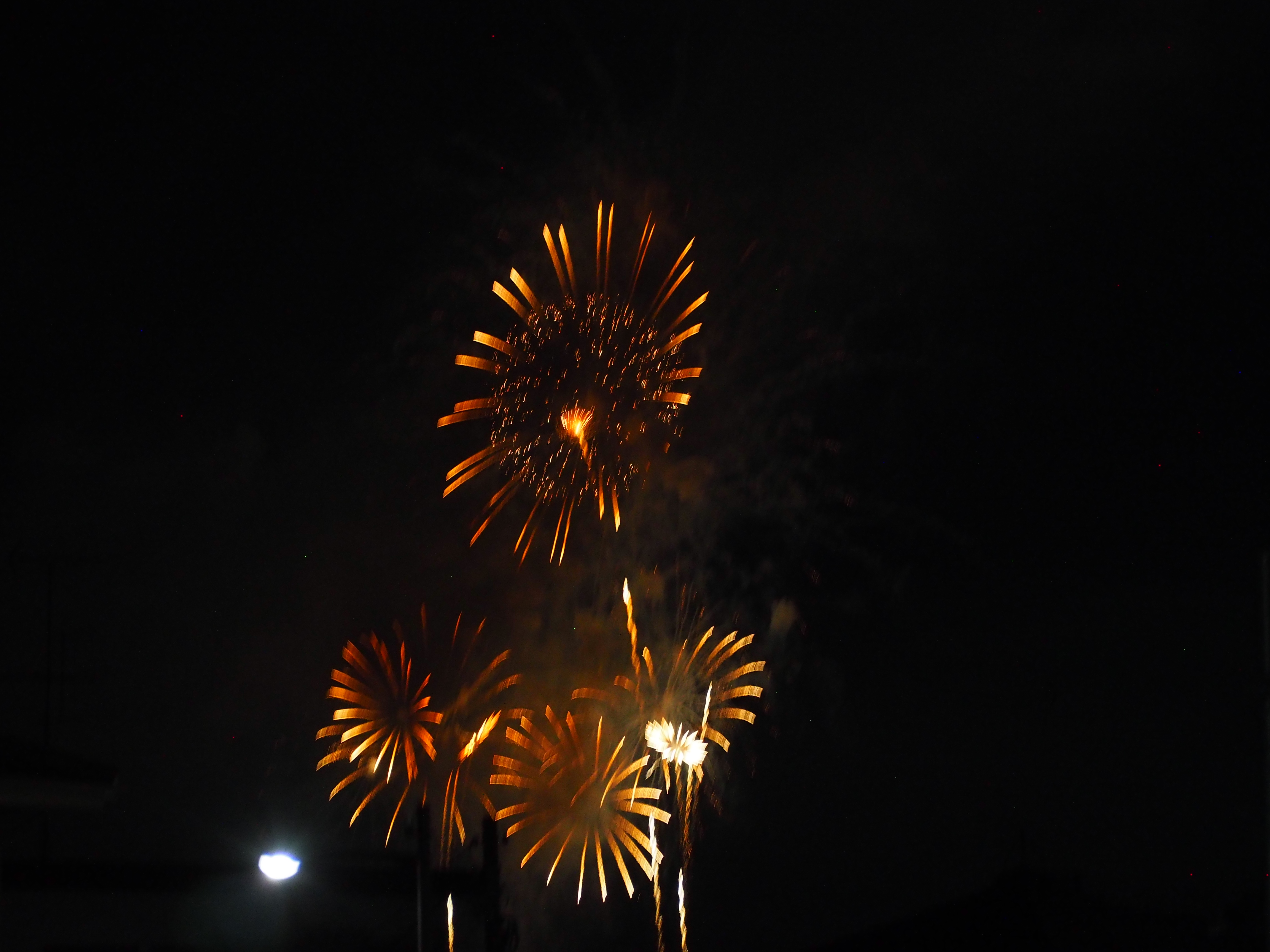 Orange fireworks during the 2019 Chofu fireworks event