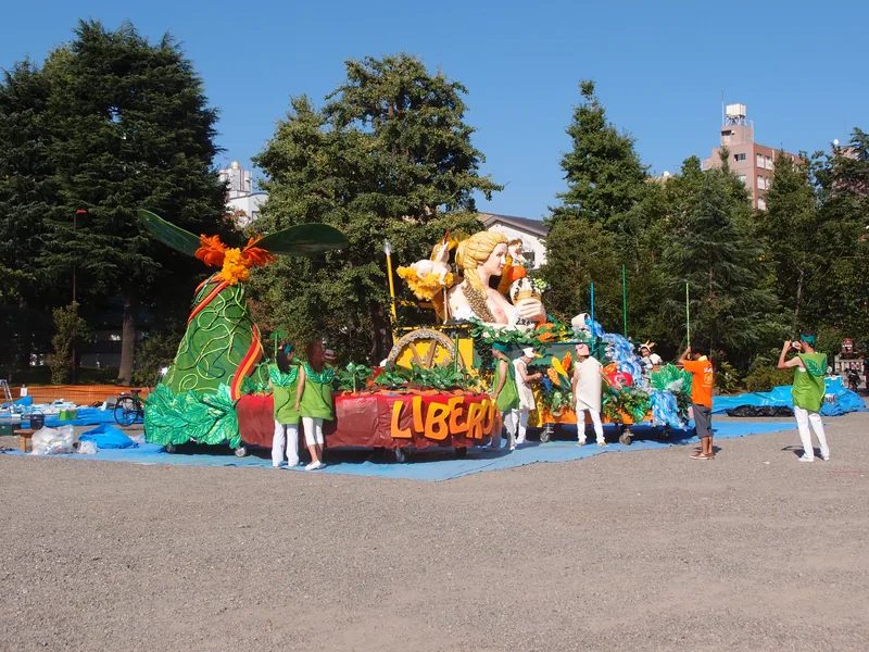A decorated float and people at a past Asakusa Samba event.