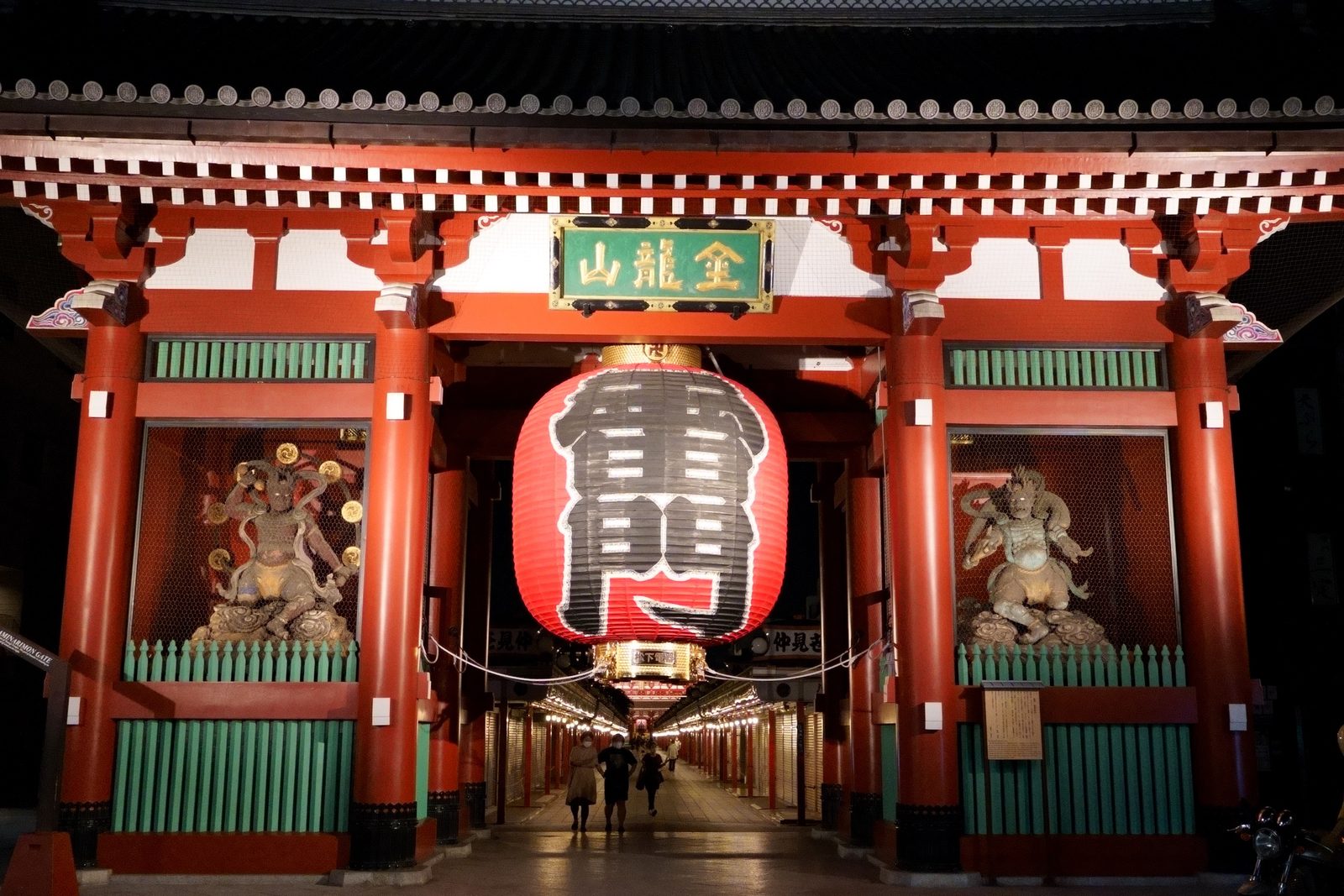 Kaminarimon gate at night, shown as nearby Asakusa context rather than a Tori no Ichi market scene.